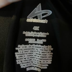 Altheltic Black 100% polyester short sleeve black shirt.4X easy care NWT